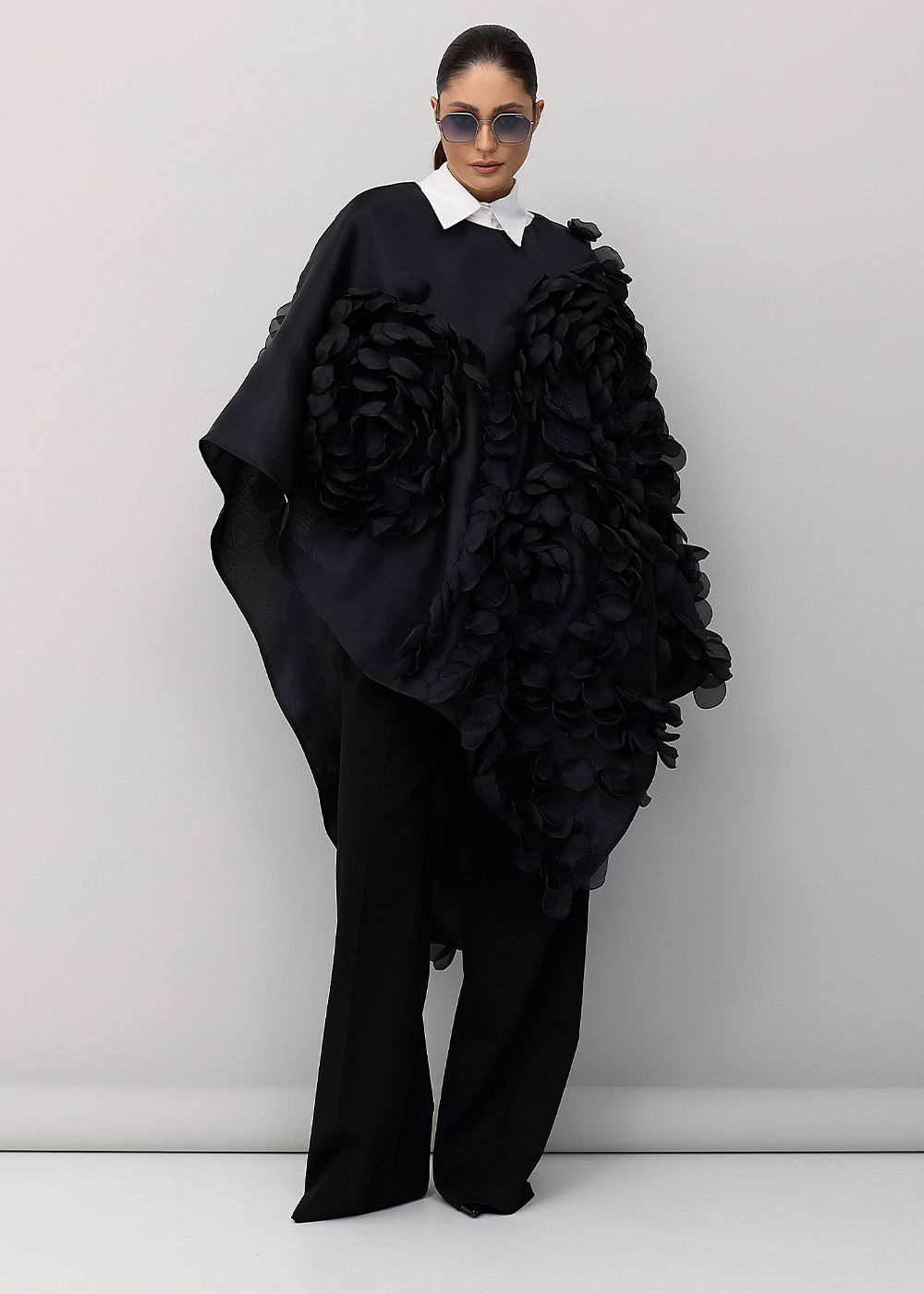 Asymmetrical black cape