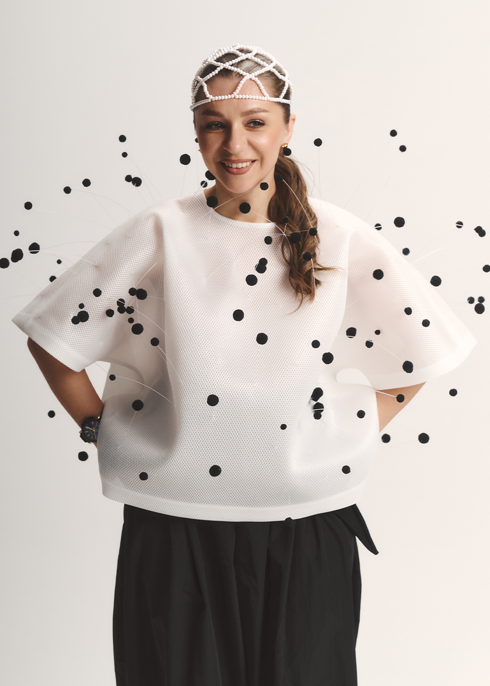 Top of voluminous neoprene with decoration