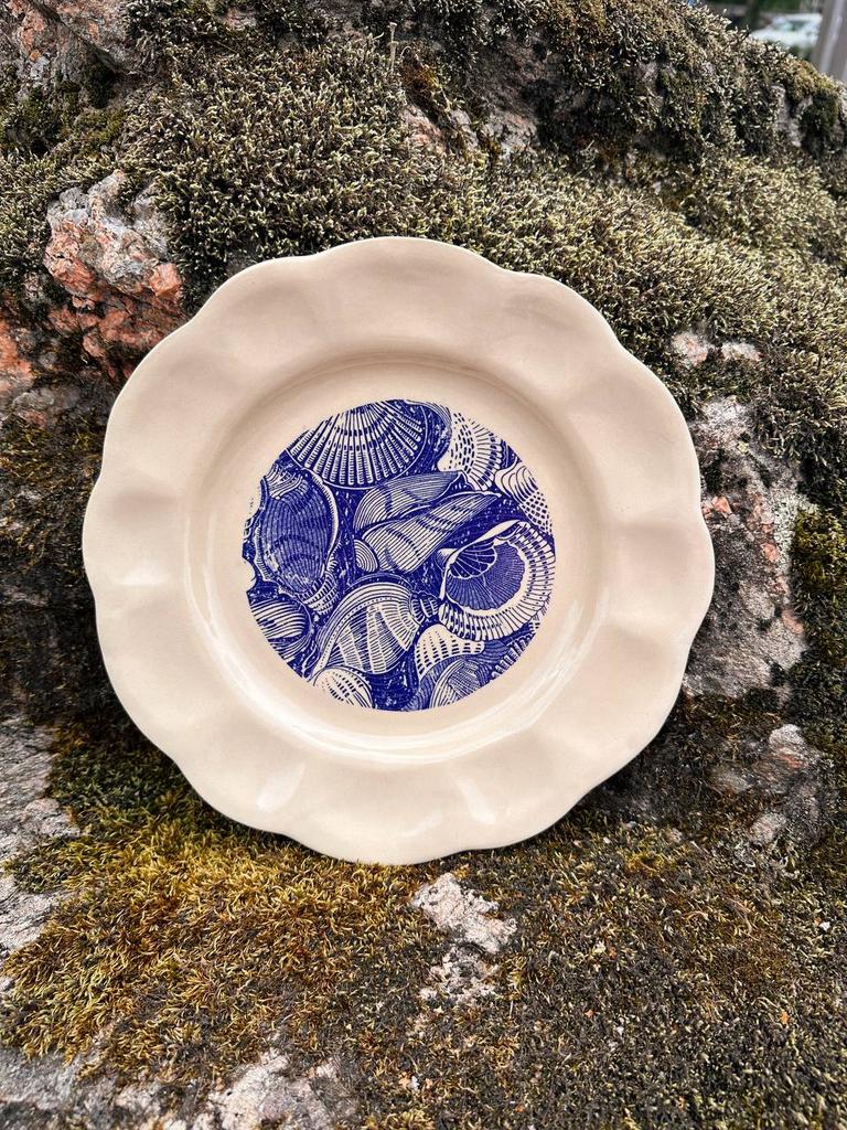 Тарелка с ракушками