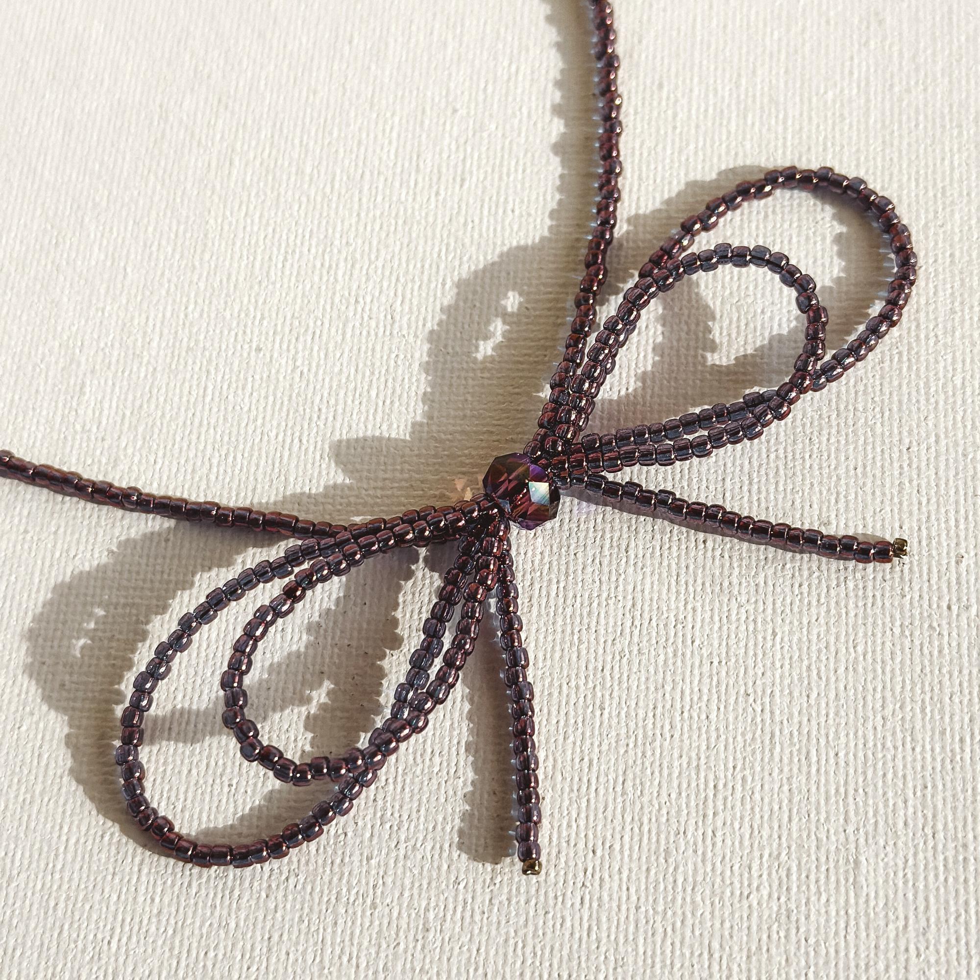 Колье бант аметист