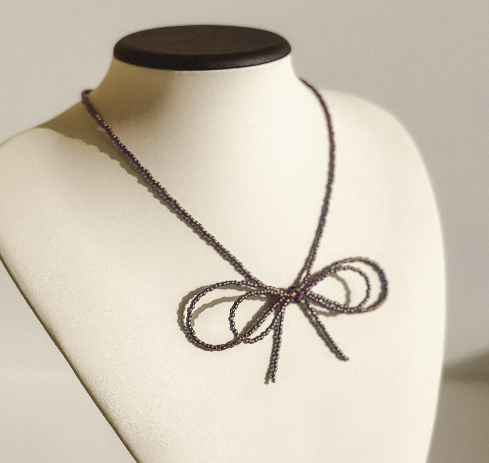 Колье бант аметист