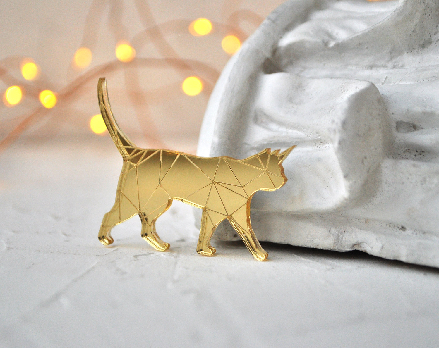 Которог - зеркальная брошь