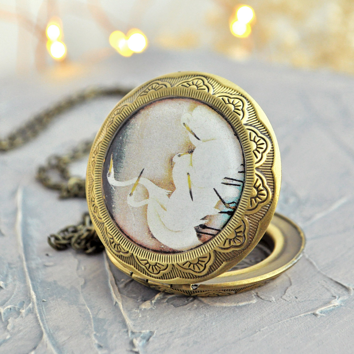 Цапли - медальон на цепочке