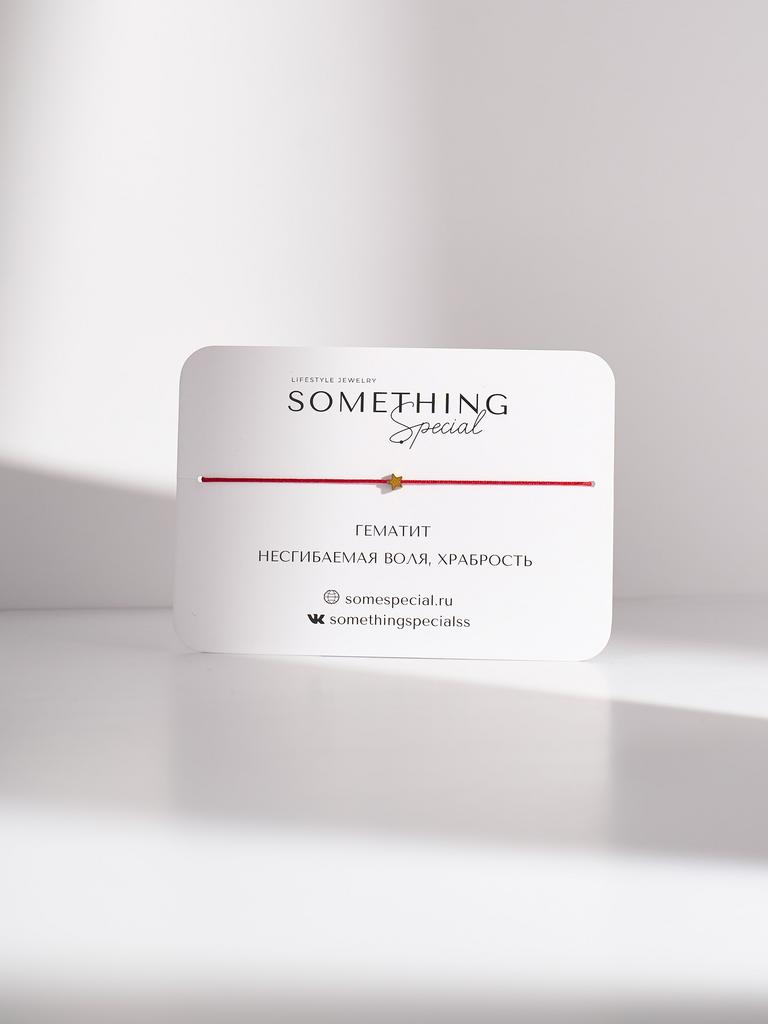 Браслет с золотой мини звездой на красной и черной нитях