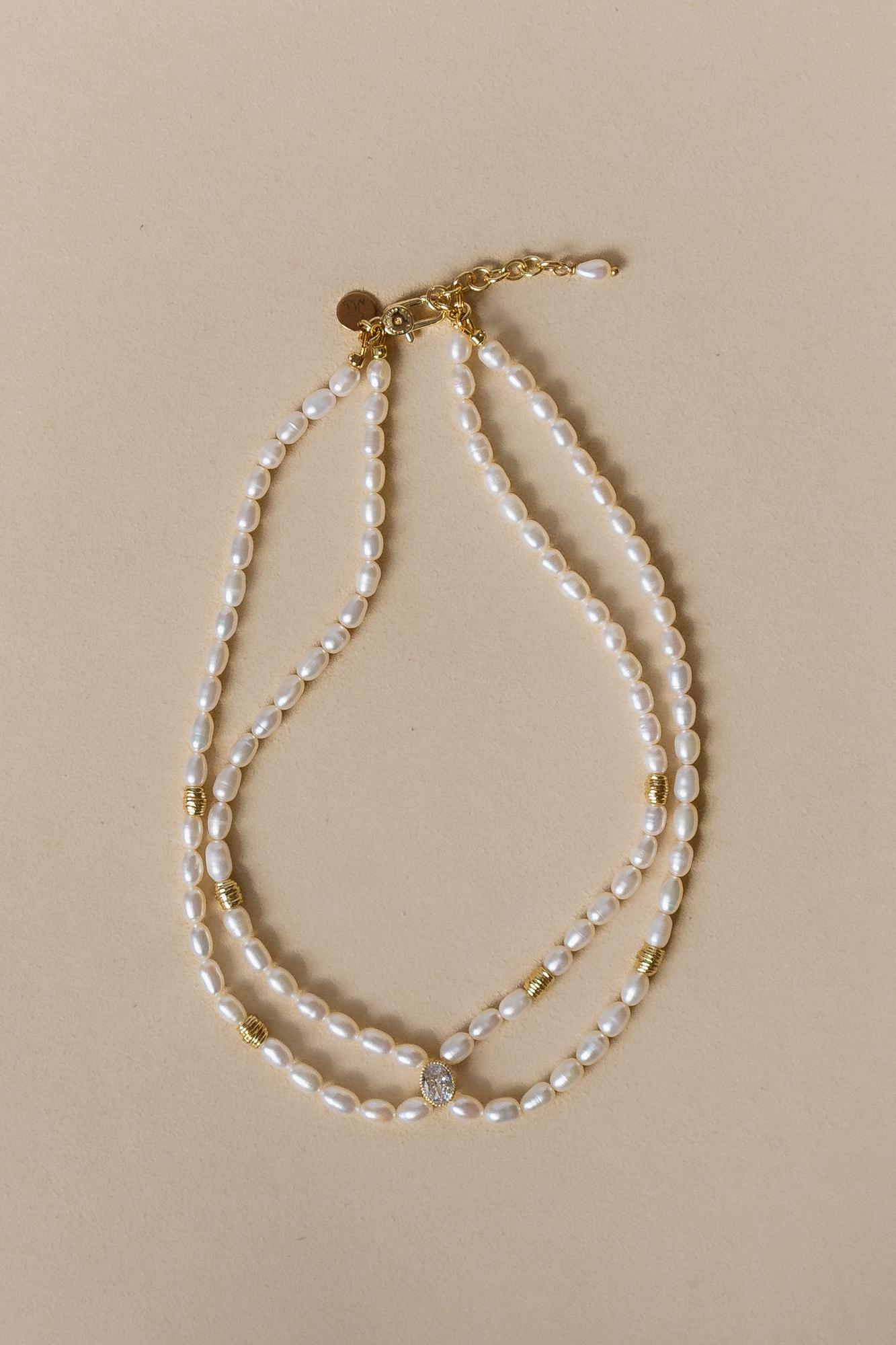 Чокер двойной жемчуг с вставкой кристалом