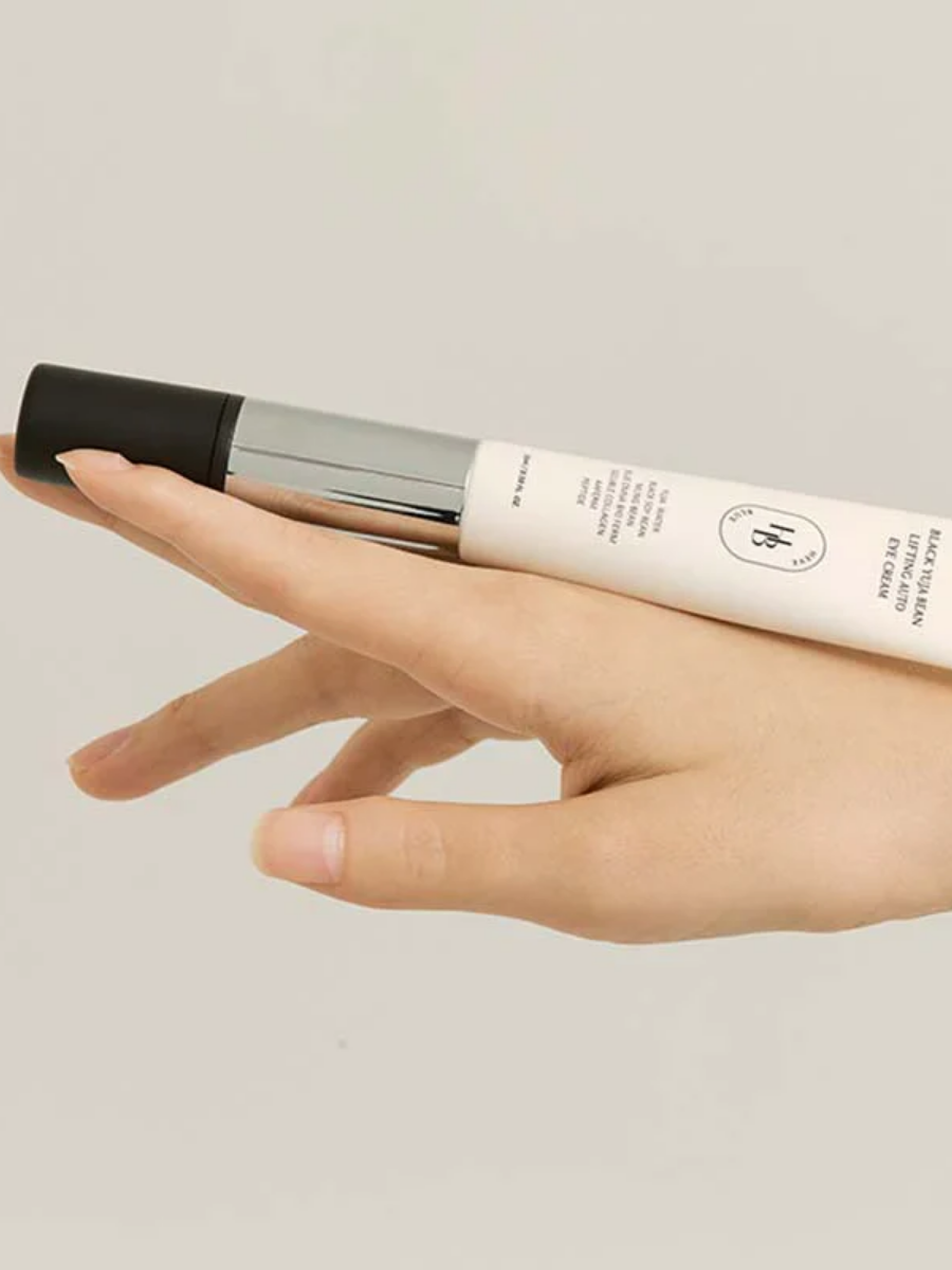 Лифтинг крем для век с массажером HEVEBLUE Black Yuja Bean Lifting Auto Eye Cream 15ml