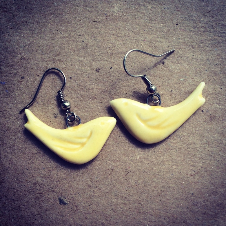 Желтые птички