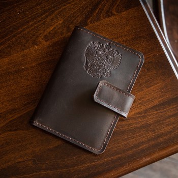 Оттиск герба РФ на изделии из кожи Гинзо