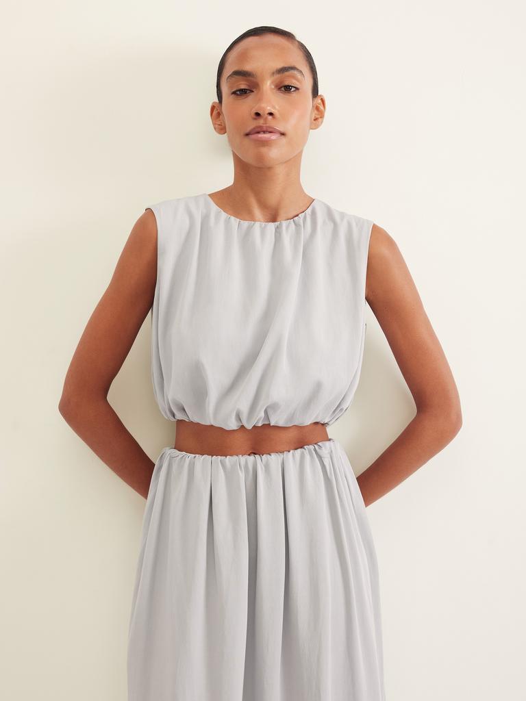 Топ со сборками голубого цвета