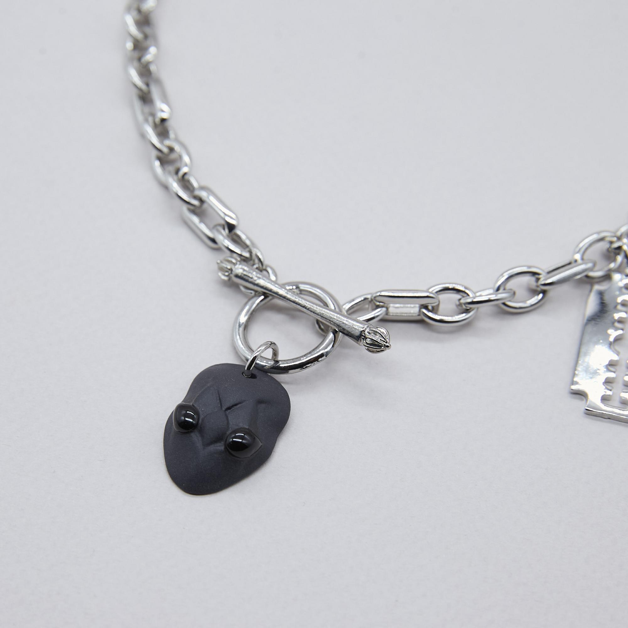 Колье змея черная с крылом и бритвой в серебре