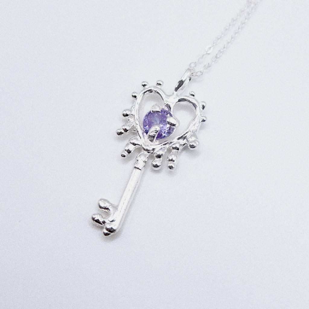 Подвеска «Ключик» с сиреневым фианитом
