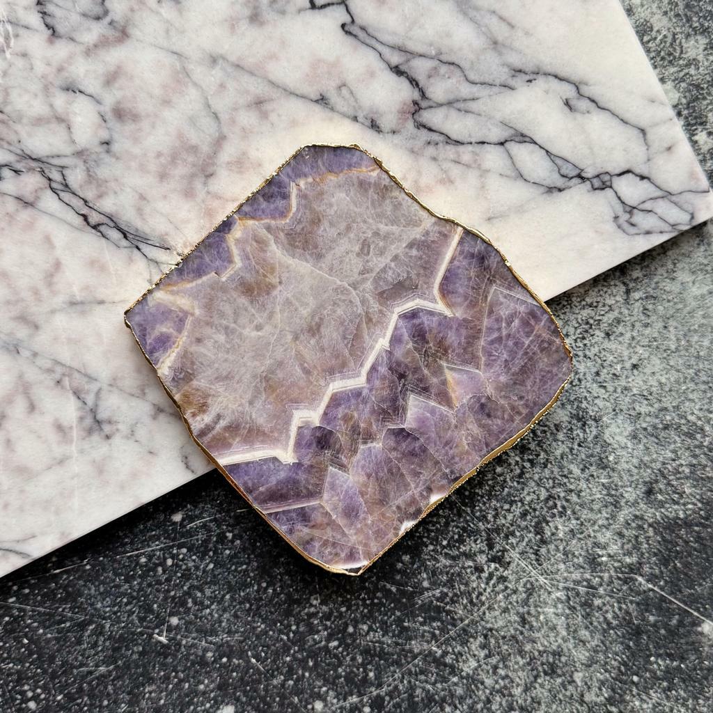 Срез аметиста в золоте