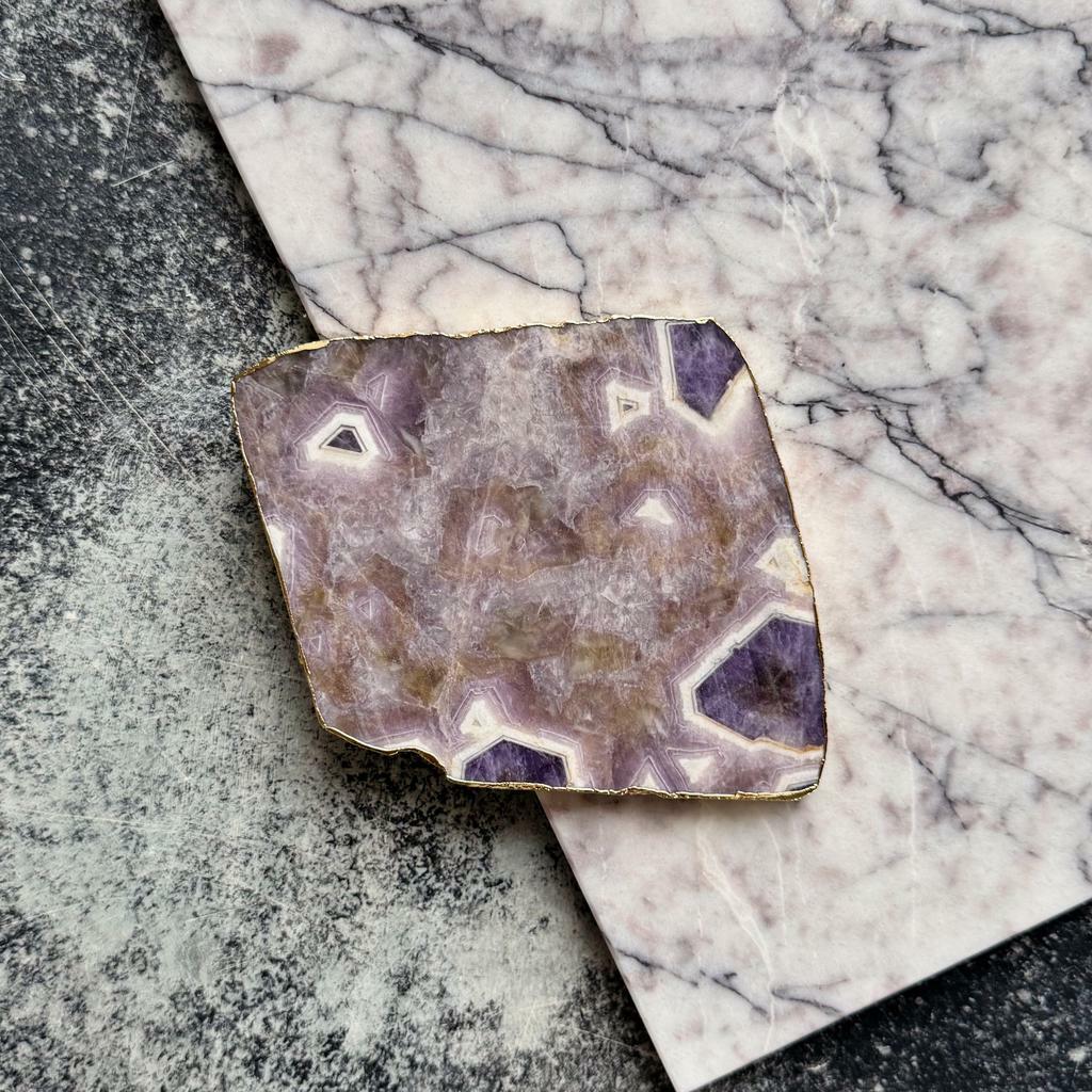 Срез аметиста в золоте