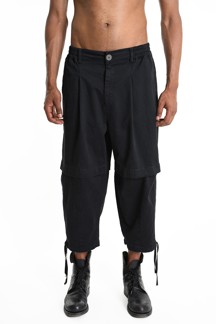 Брюки мраморного окраса с вырезами в области колен LH