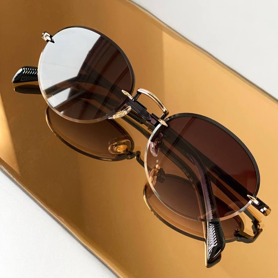 Круглые солнцезащитные очки женские
