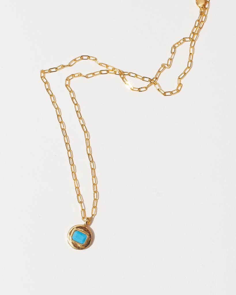 Медальон с голубым камнем