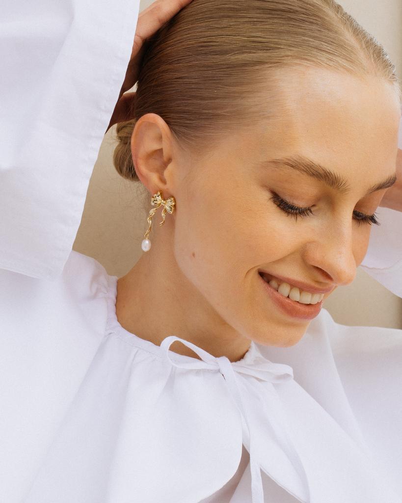 Серьги бантики