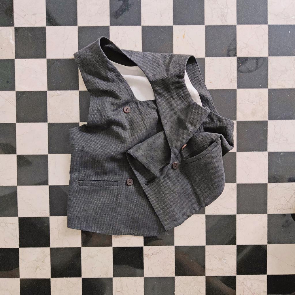 Znatok's vest made for a wooden horses maker