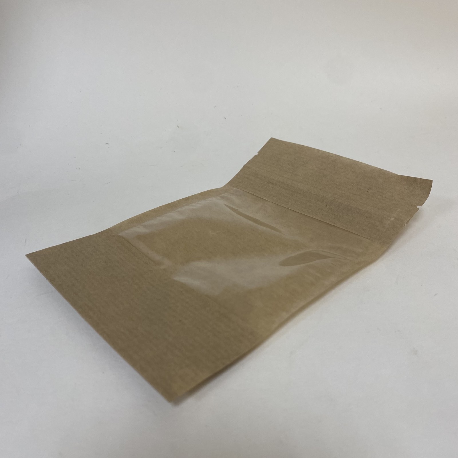 Пакет бумажный с окном 120(90)х185х35, крафт, зип лок, 100 штук/упак.