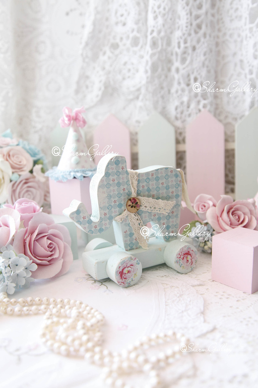 Слоник на колесиках "Blue". Деревянная игрушка