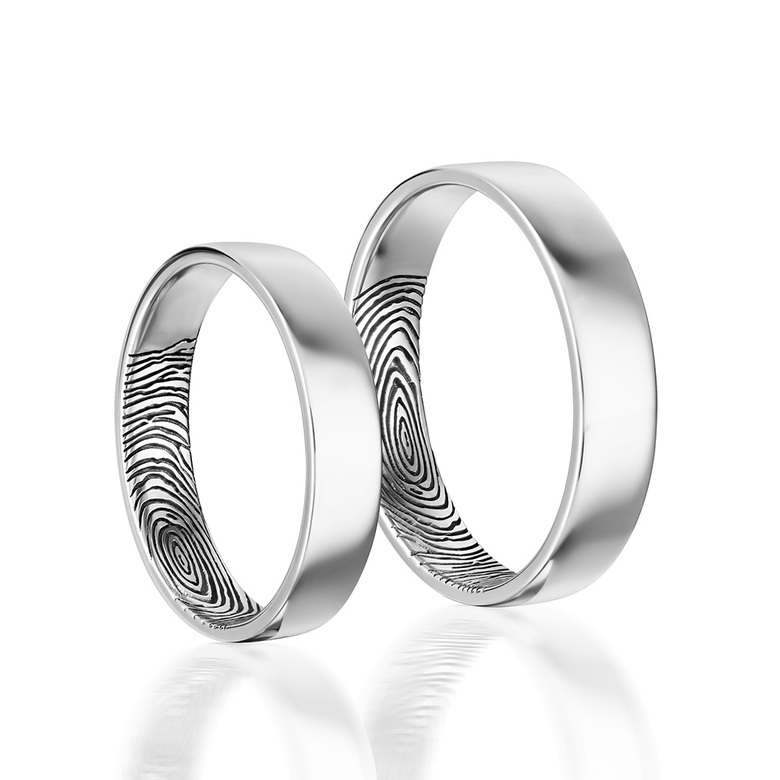 Обручальные кольца с отпечатками пальцев на внутренней стороне