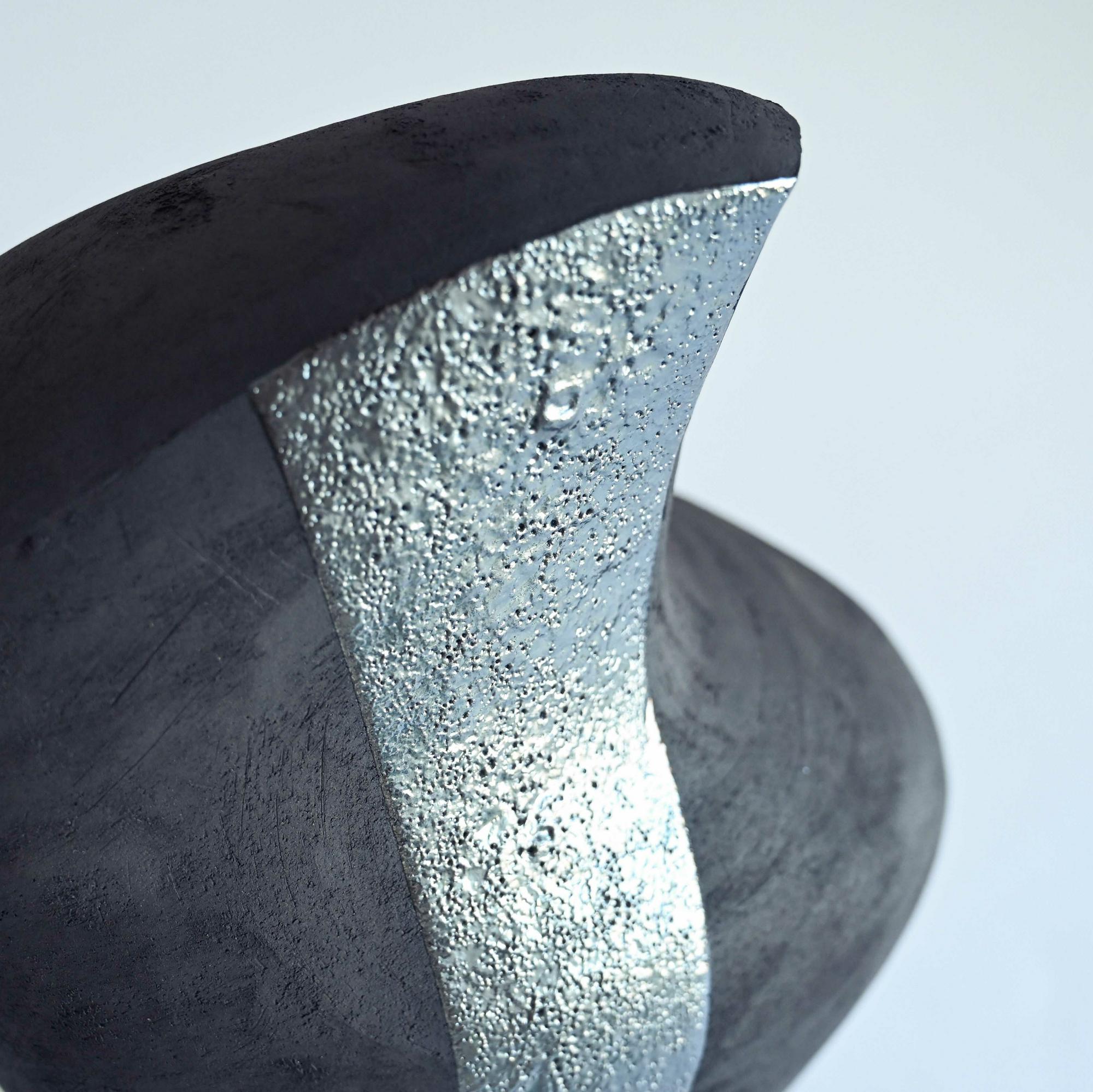 Handmade ceramic art object black and silver details