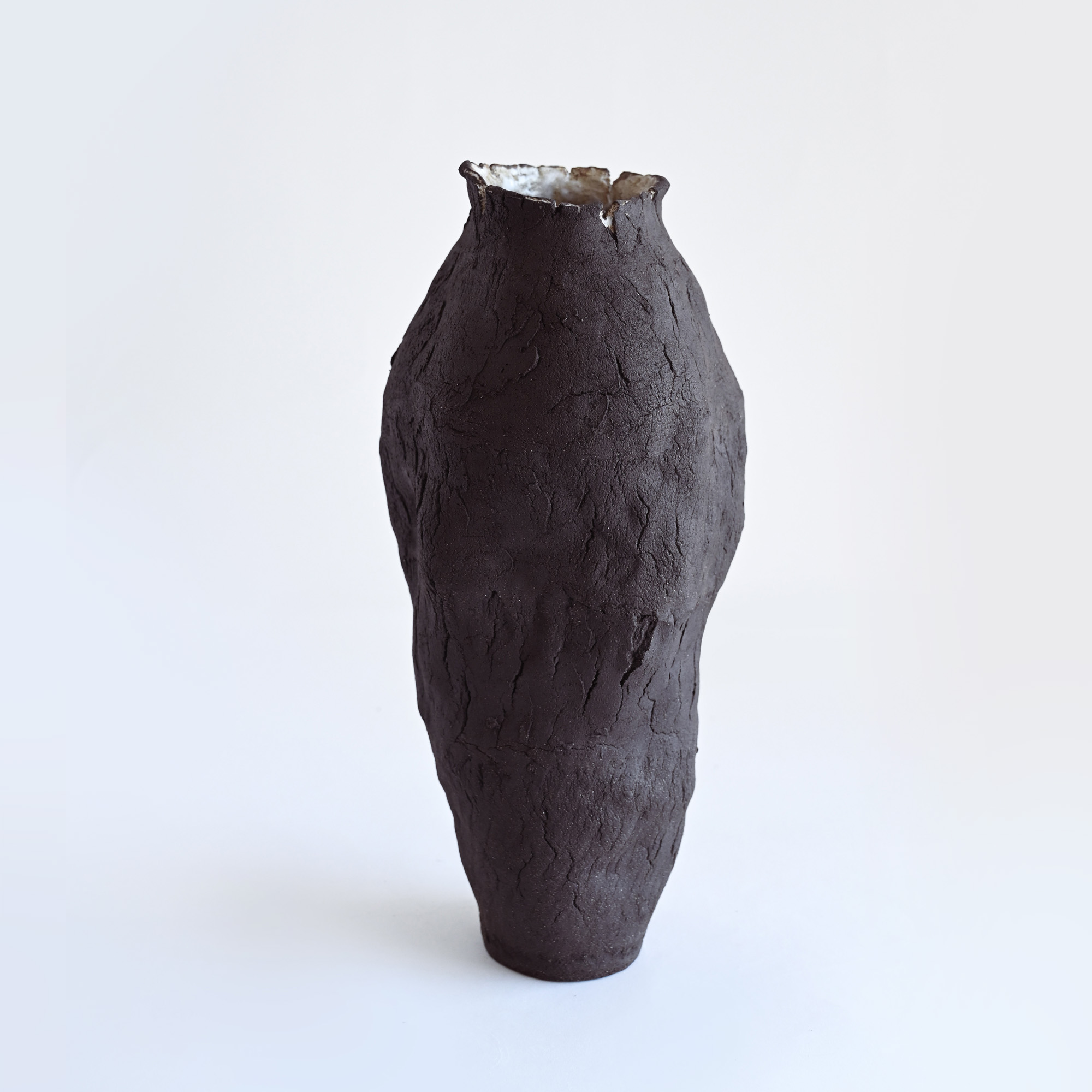 Dark brown ceramic vase rustic/boho style with a unique texture