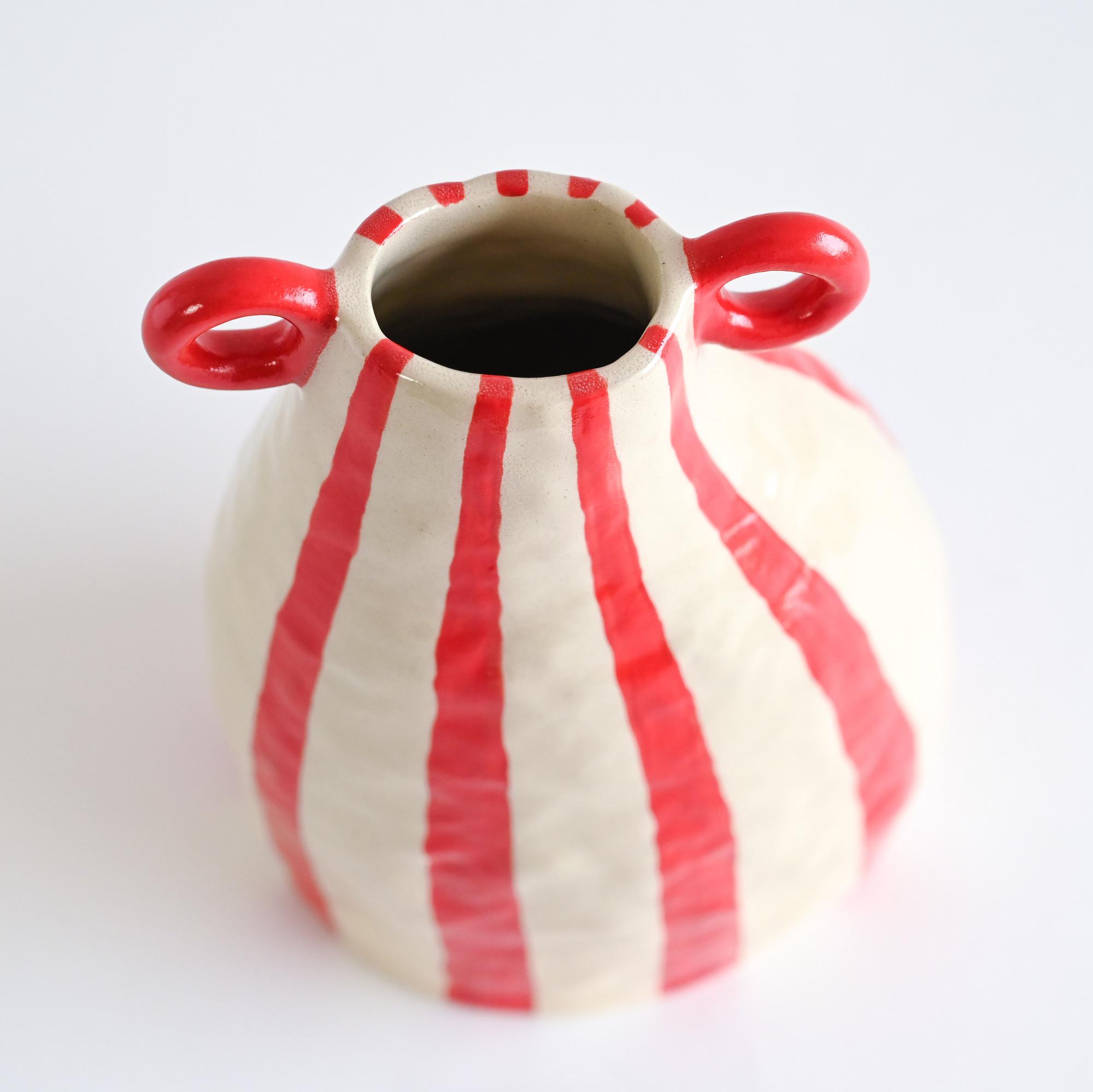 Handmade ceramic vase with white and red stripes