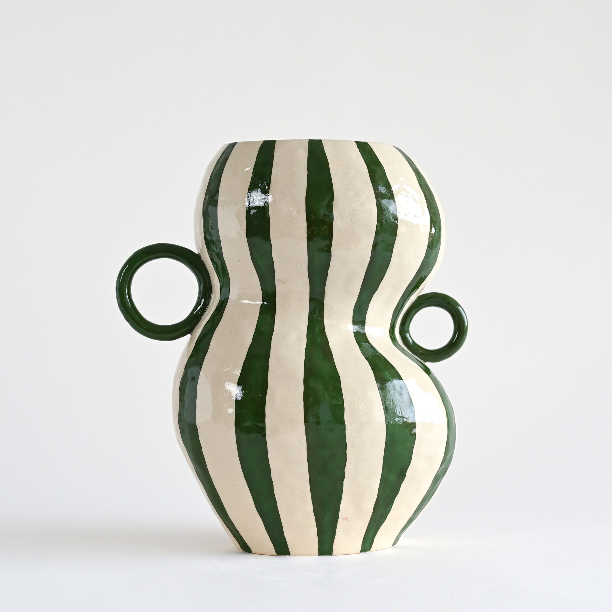 Handmade ceramic vase with white and green stripes