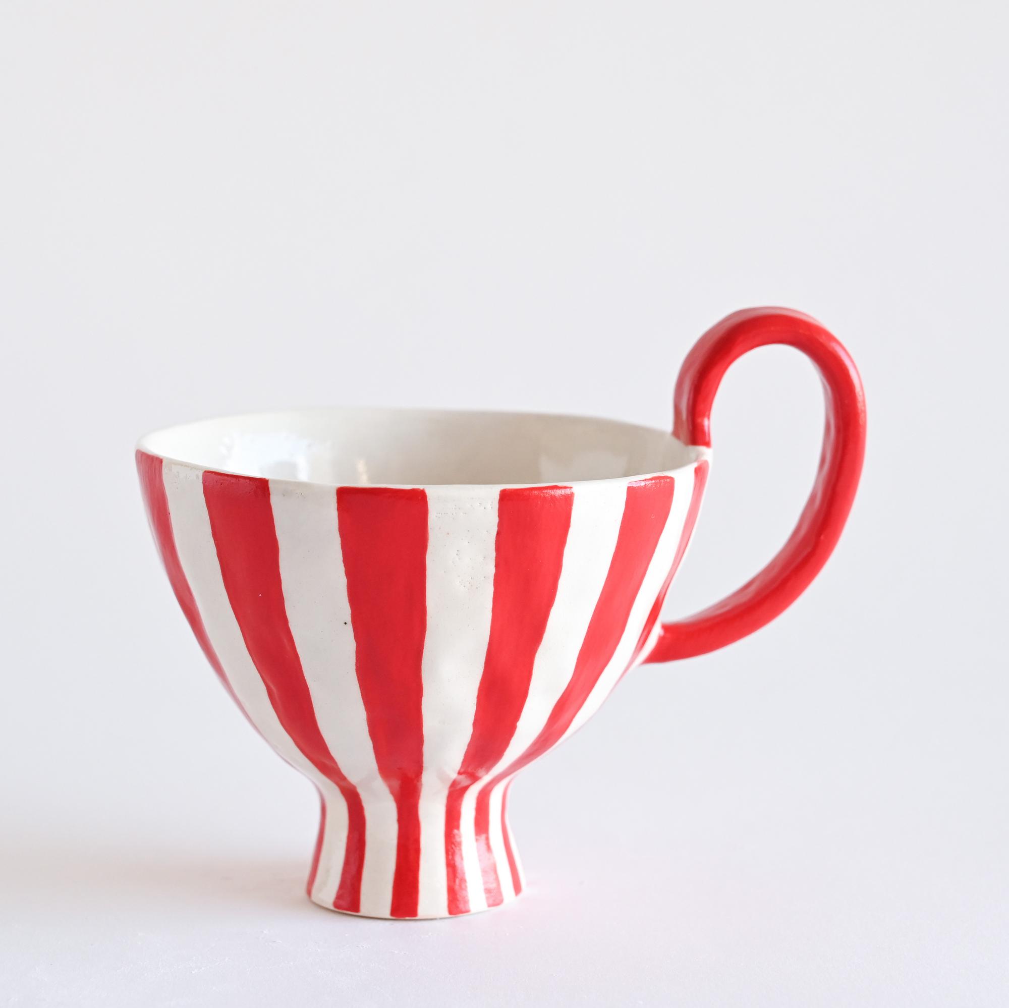 Christmas ceramic mug with red and white stripes