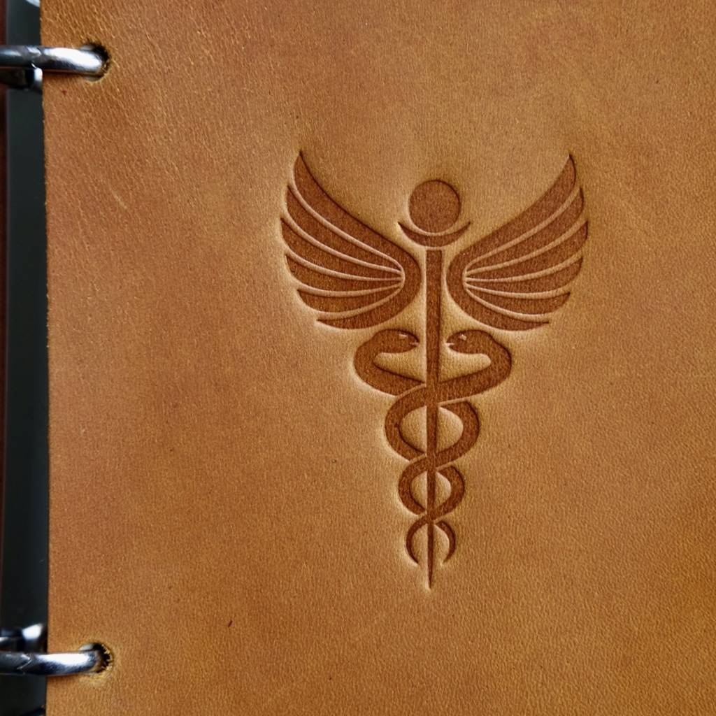 Кадуцей  - символ примирения, мирной международной торговли и медицины.