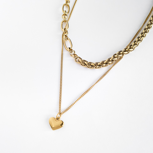 Подвеска ELINICE с сердечком и цепями разного плетения в золоте