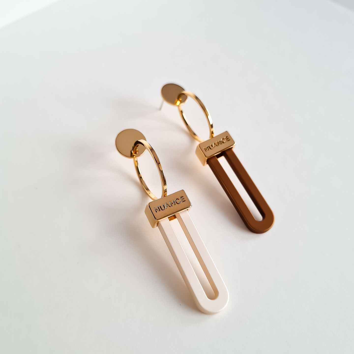 Серьги NUANCE золотистые на кольцах геометричные элементы
