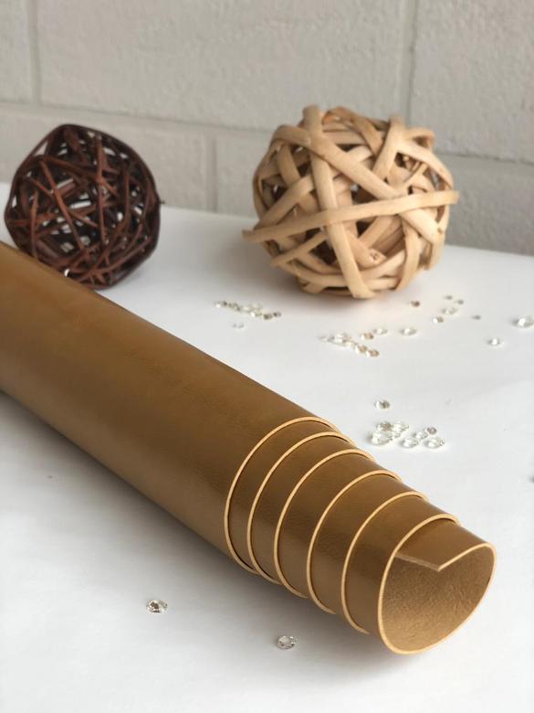 Кожзам золотой 30*70