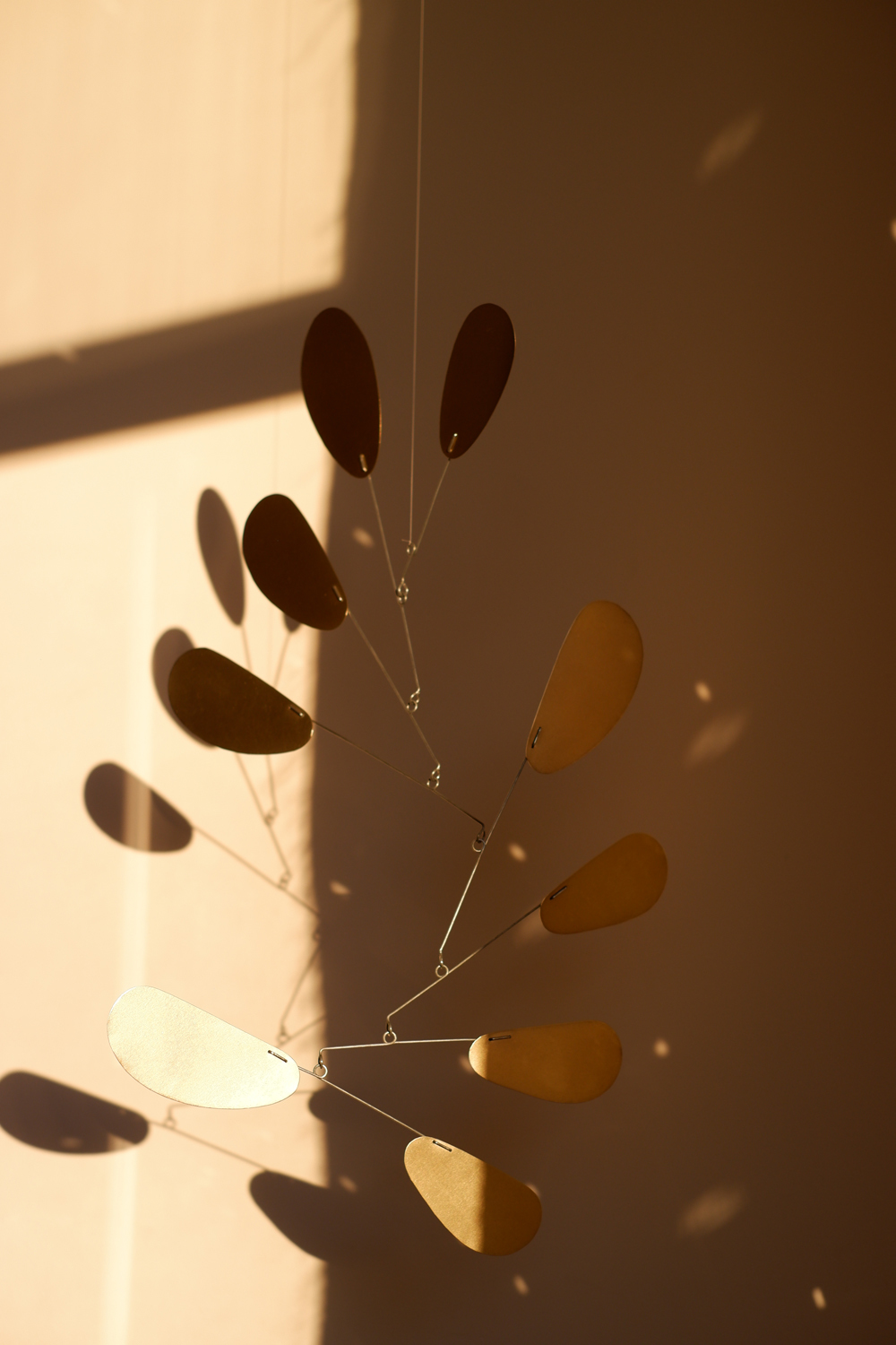 All mobiles > Dolly Brass hanging kinetic mobile Buy from e-shop