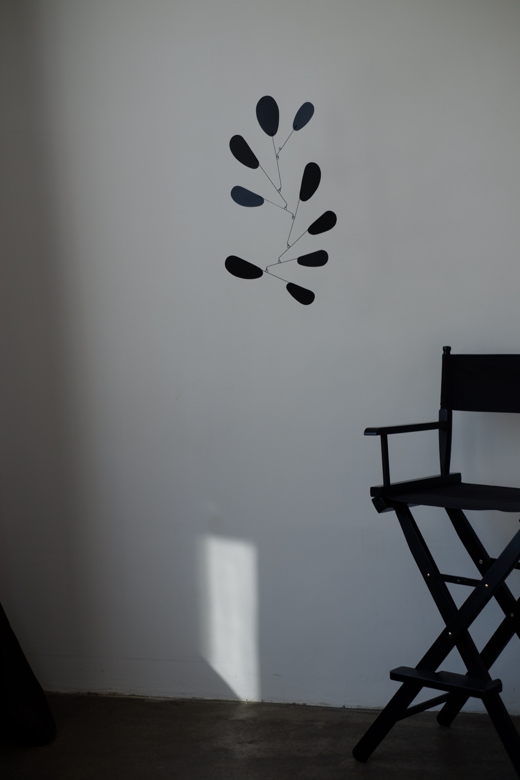 Dolly Black hanging kinetic mobile