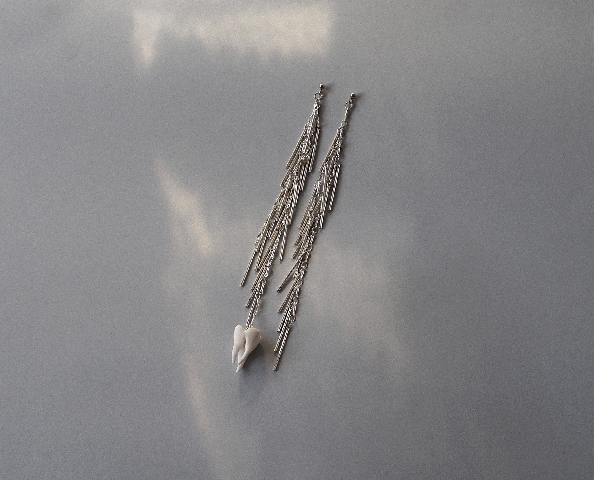 серьги ассиметричные цепочки и зуб