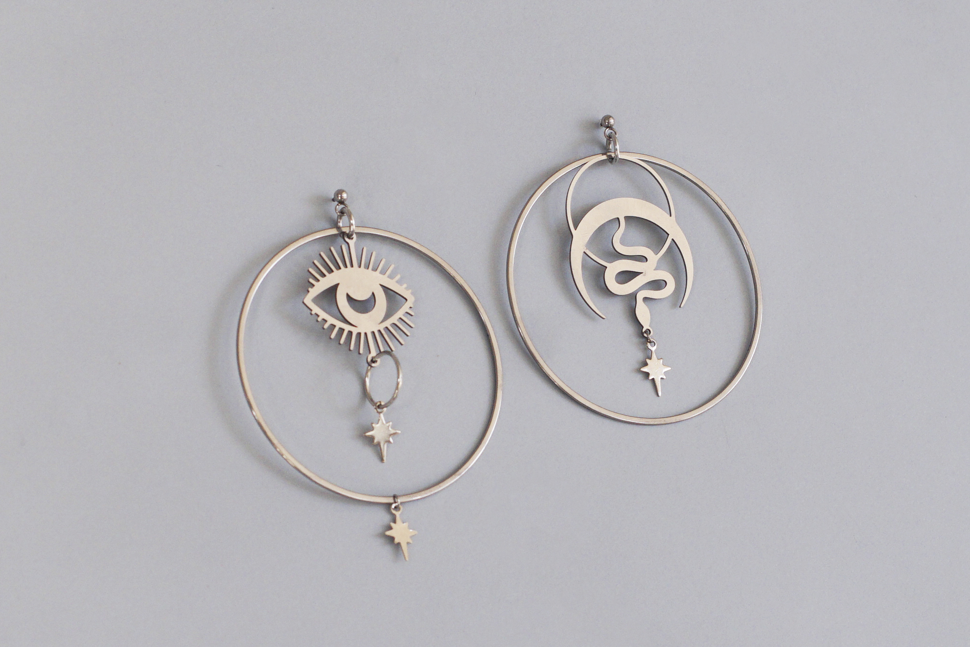 серьги стальные кольца со змеей