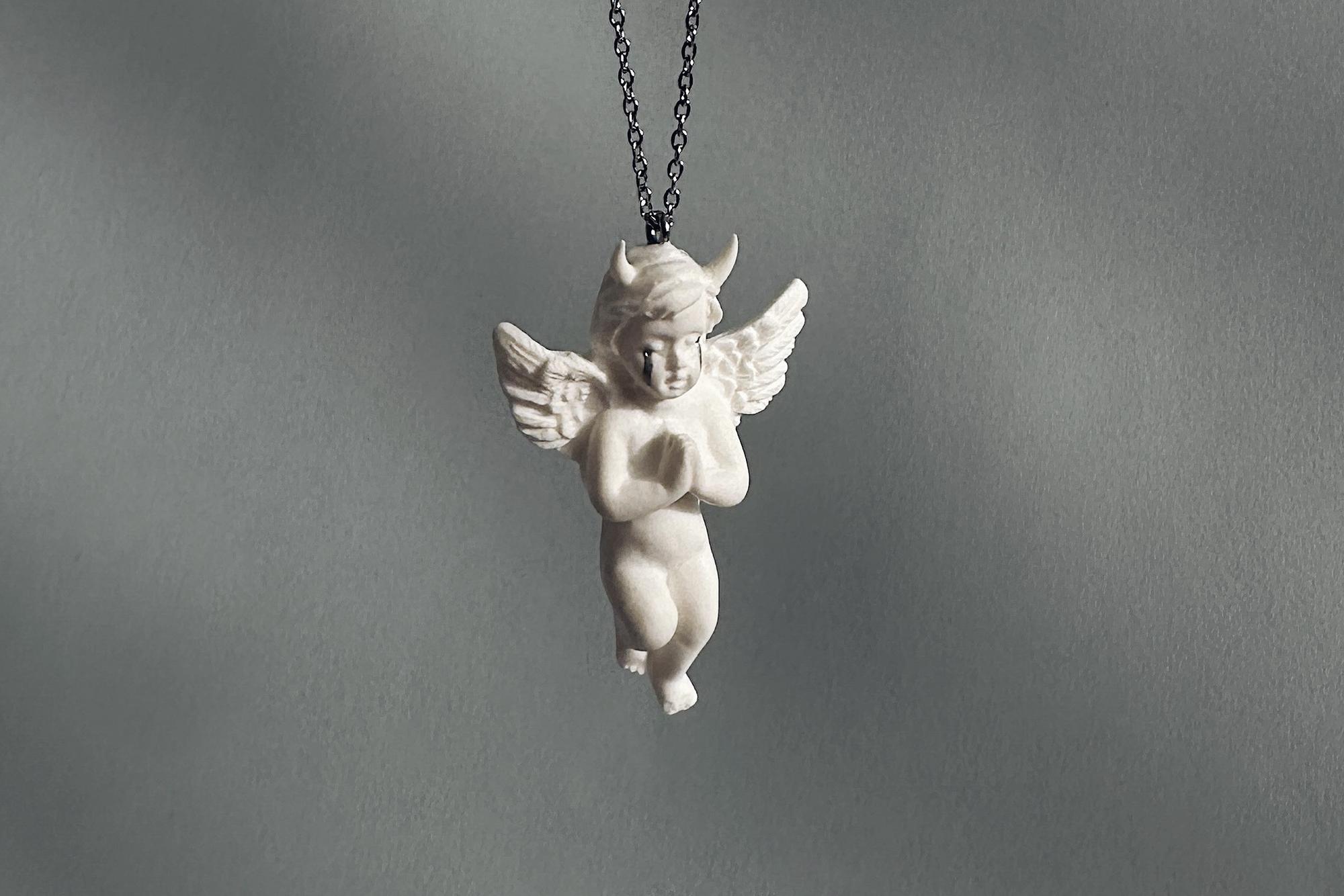 кулон белый ангел-бес
