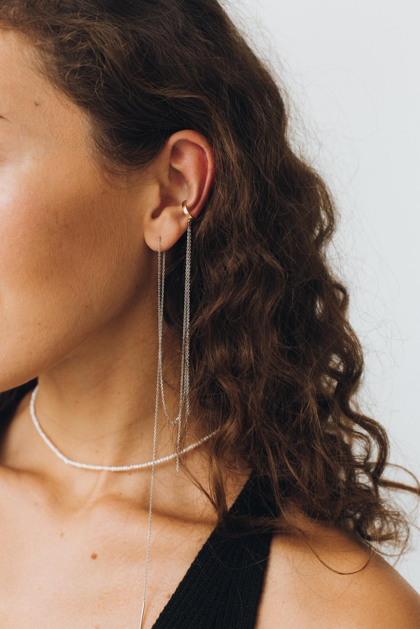 Серебряная серьга "Движение"