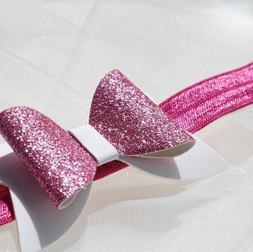 Повязка на голову "Блестящий бант" розовый цвет