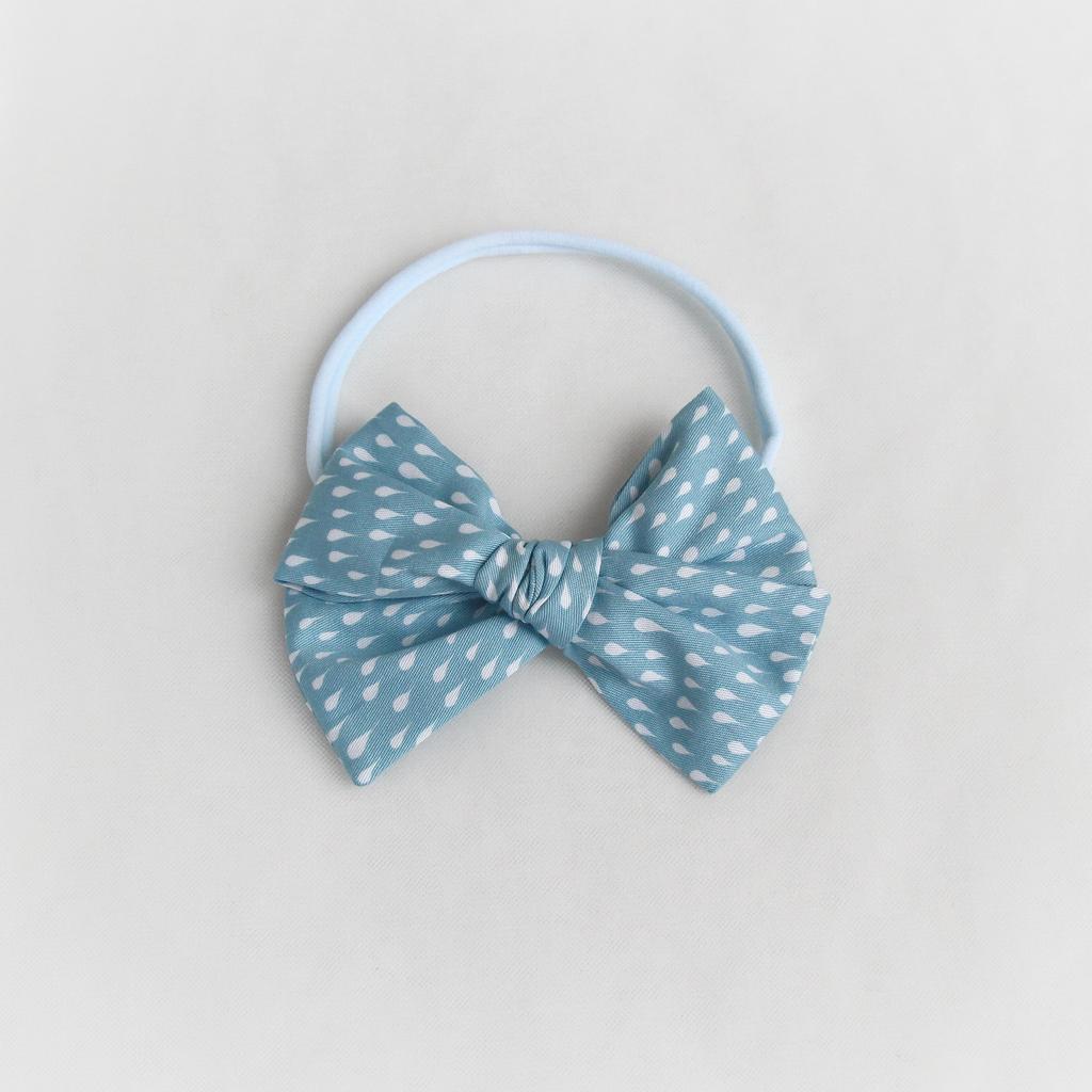 Повязка на голову "Хлопковый бант" голубой с капельками