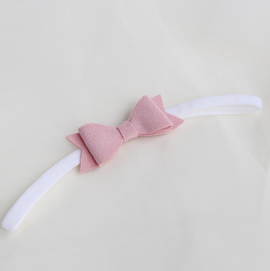 Повязка на голову "Замшевый бантик" цвет розовый