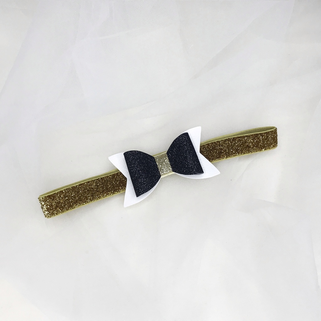 Повязка на голову "Блестящий бант" черно-белый с золотом