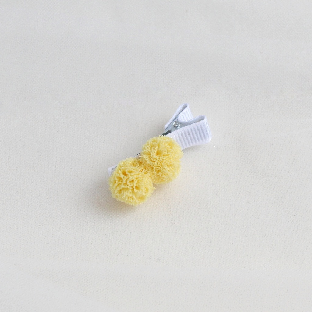 Заколка-зажим "Помпоны" желтый