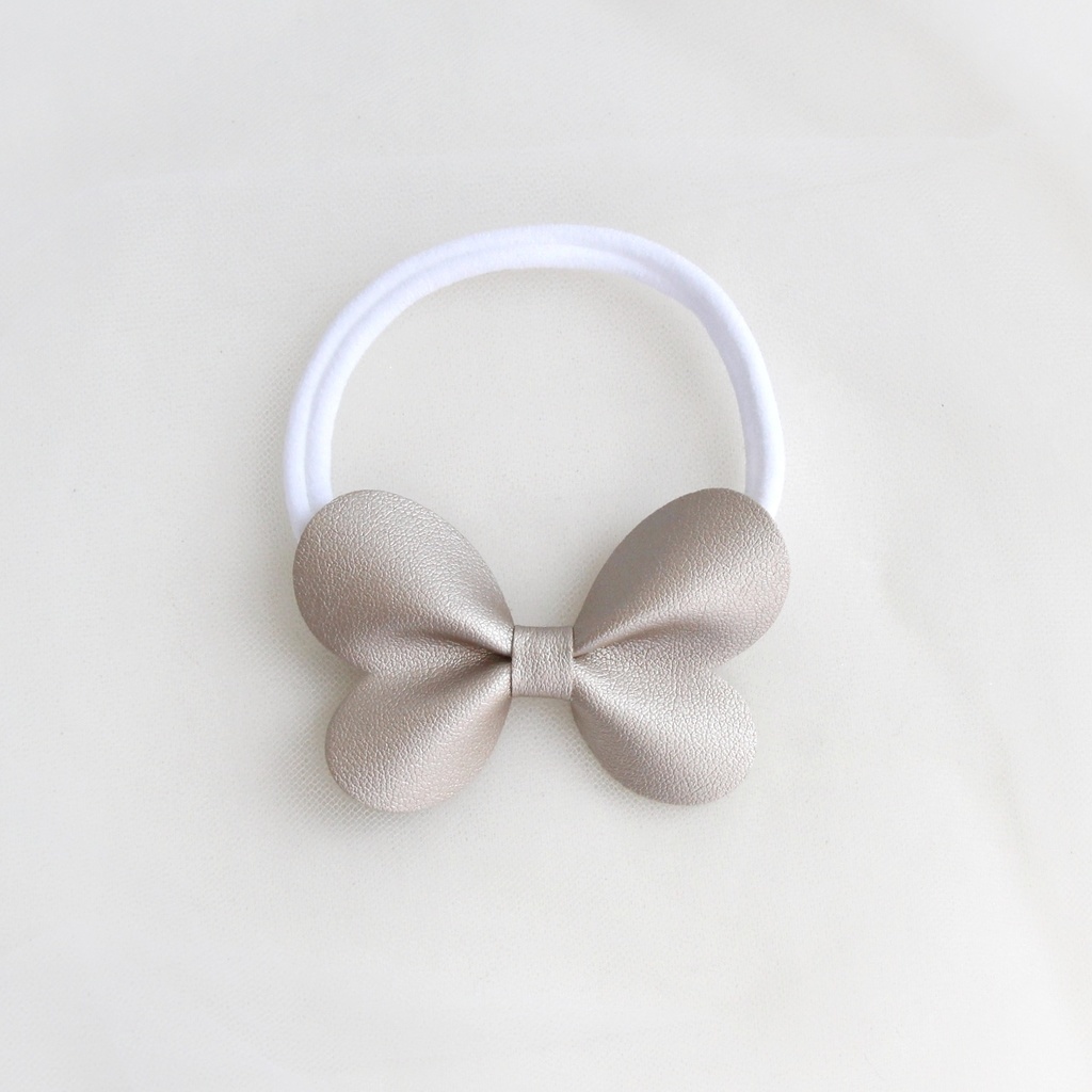 Повязка на голову "Бантик-бабочка" золотой