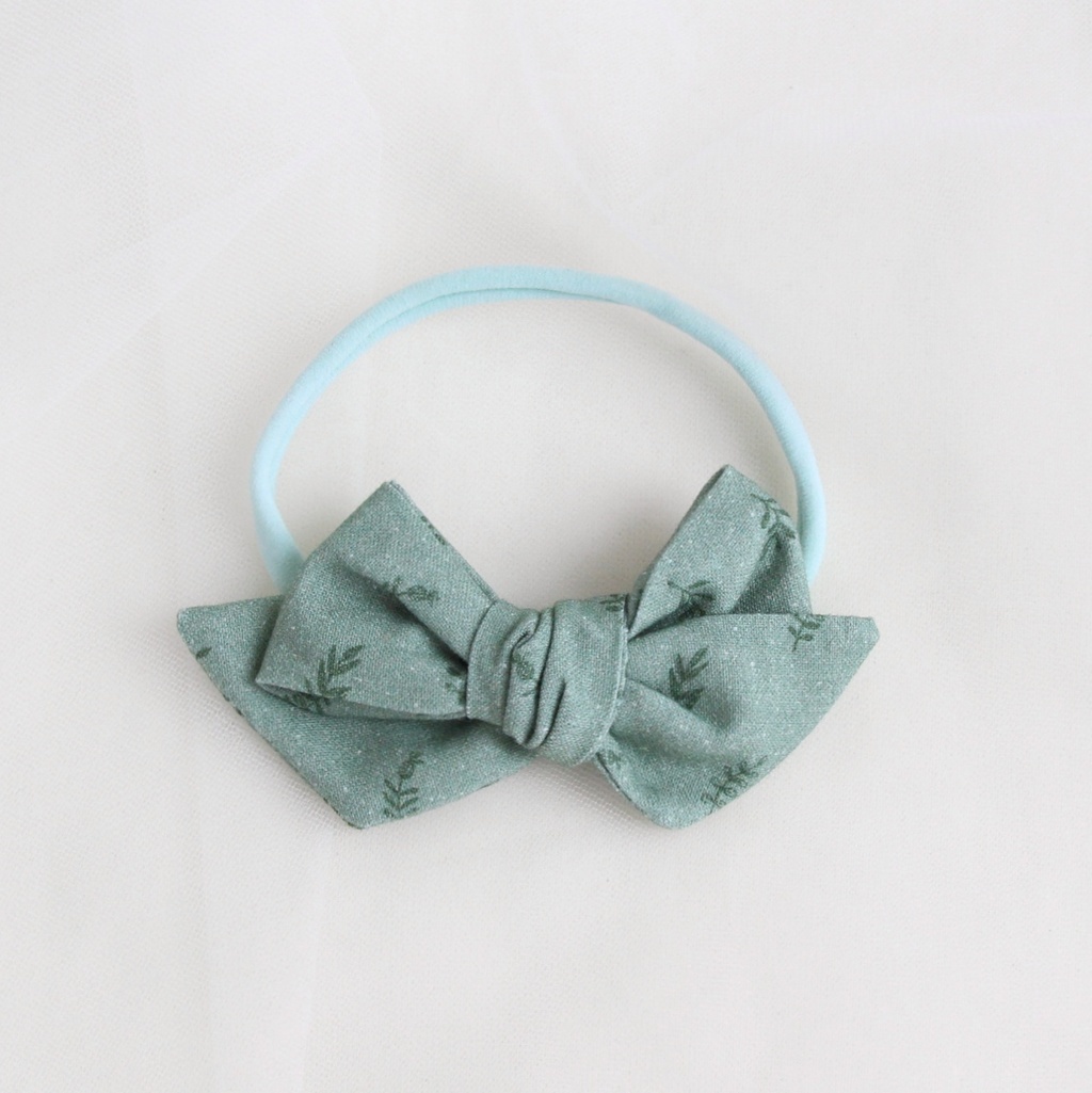 Повязка на голову "Хлопковый бант" зеленый с веточками