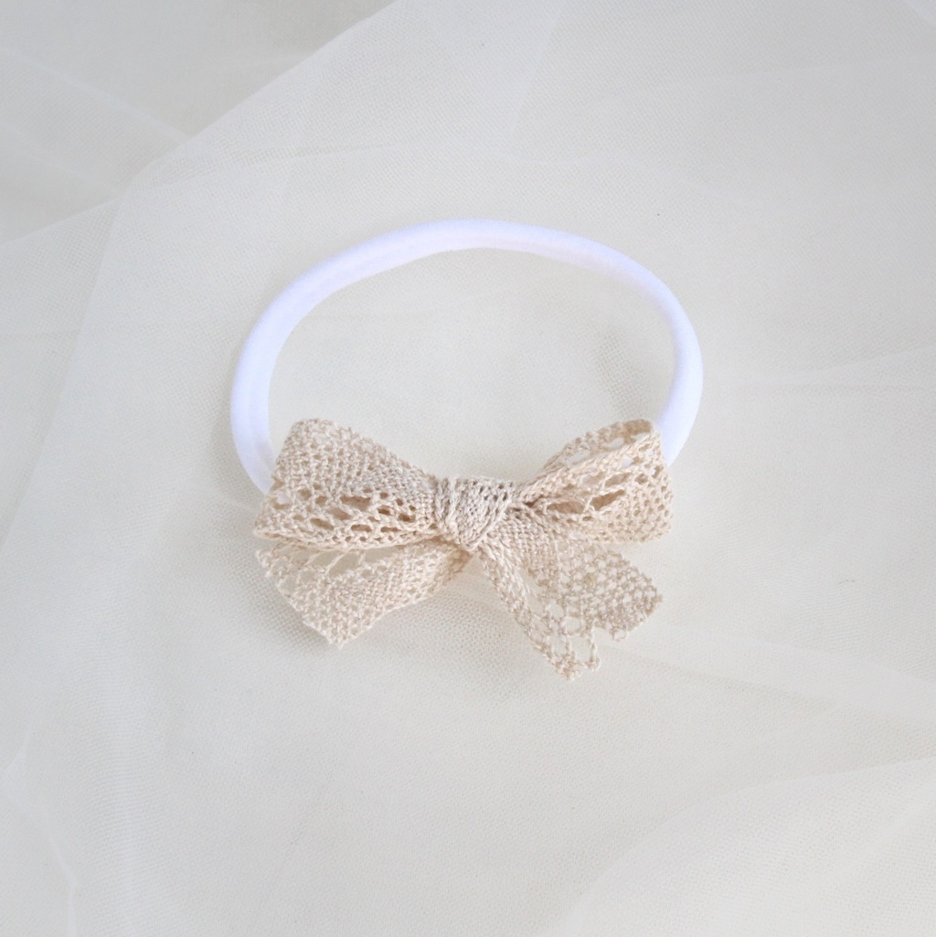 Повязка на голову "Кружевной бантик" бежевый