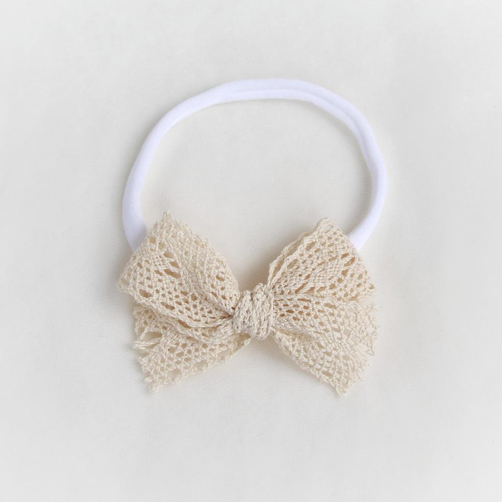 Повязка на голову "Кружевной бантик" бежевый