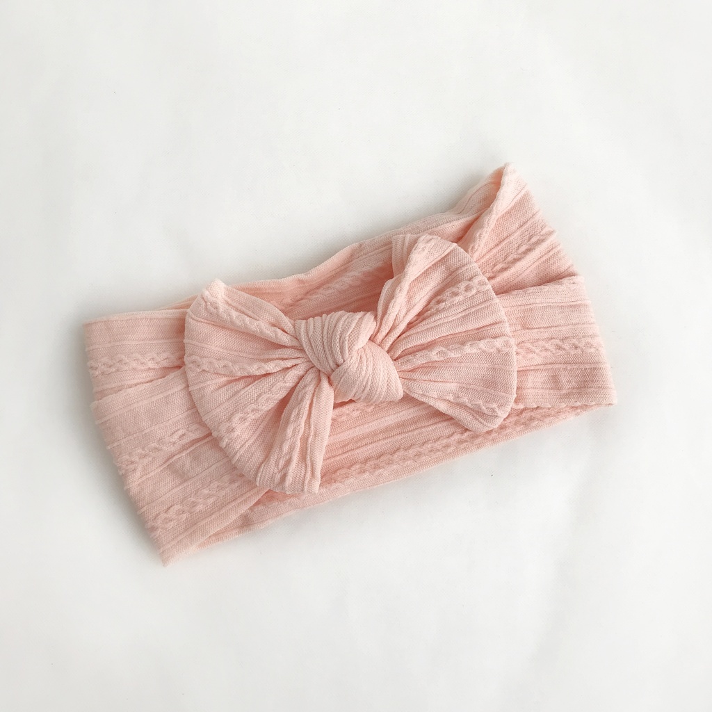 Повязка на голову "Широкий бант с узором" персиковый